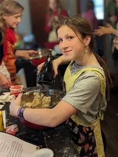 Volunteers of all ages participate in the baking. (Courtesy of Cookies for the Troops LLC)