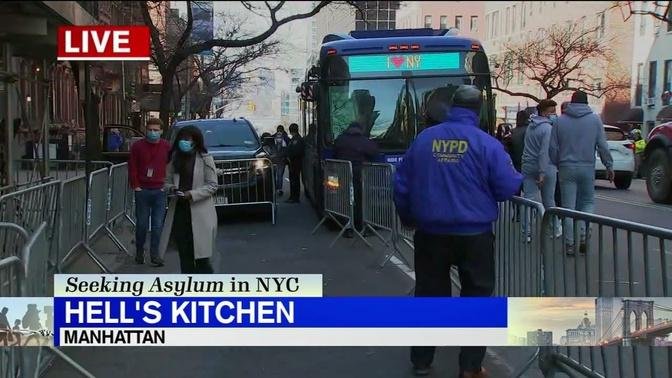 NYPD clearing migrants from in front of Hell's Kitchen hotel