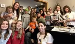 The volunteers who participated in last year's bake. In the center, in a green t-shirt, is Justin Flynn. (Courtesy of Cookies for the Troops LCC)