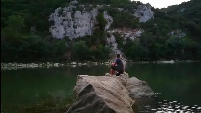 ALONE IN A WILDERNESS PROSPECTING BEDROCKS QUIET PLACE BY THE RIVER