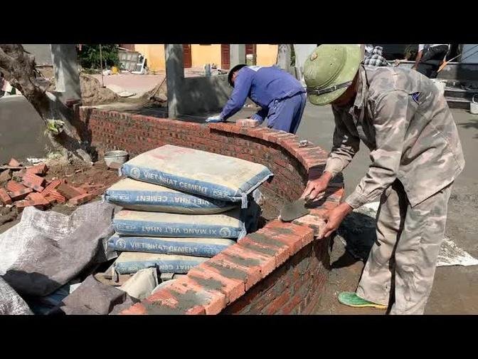 Techniques For Building A Curved Fence Around The Garden With Precise Bricks And Cement