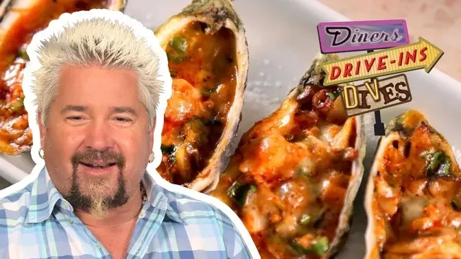 Guy Fieri Eats Grilled Stuffed Oysters | Diners, Drive-ins and Dives | Food Network