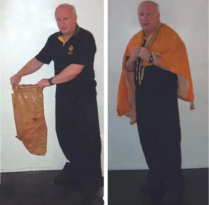 Douglas Robertson's late father, Dougal Robertson, with the cape and waterbag they used during the voyage. (Courtesy of The Robertson Family Archive)